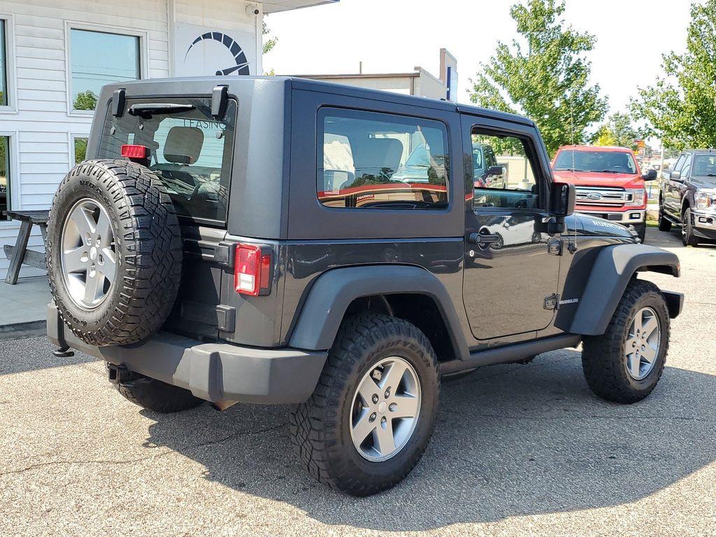 2010 Gray /Dark Khaki/Medium Khaki Jeep Wrangler Rubicon 4WD (1J4BA6D15AL) with an 3.8L V6 OHV 12V engine, 4-speed automatic transmission, located at 234 Columbia Ave, Battle Creek, MI, 49015, (269) 222-0088, 42.298264, -85.192543 - <b>Vehicle Details</b><br>Introducing a robust and reliable 2010 Jeep Wrangler Rubicon, now available at our dealership. This exceptional vehicle boasts a powerful V6, 3.8L engine and a dependable 4WD system, making it the ideal choice for both off-road adventures and daily commutes. The Wrangler Ru - Photo#1