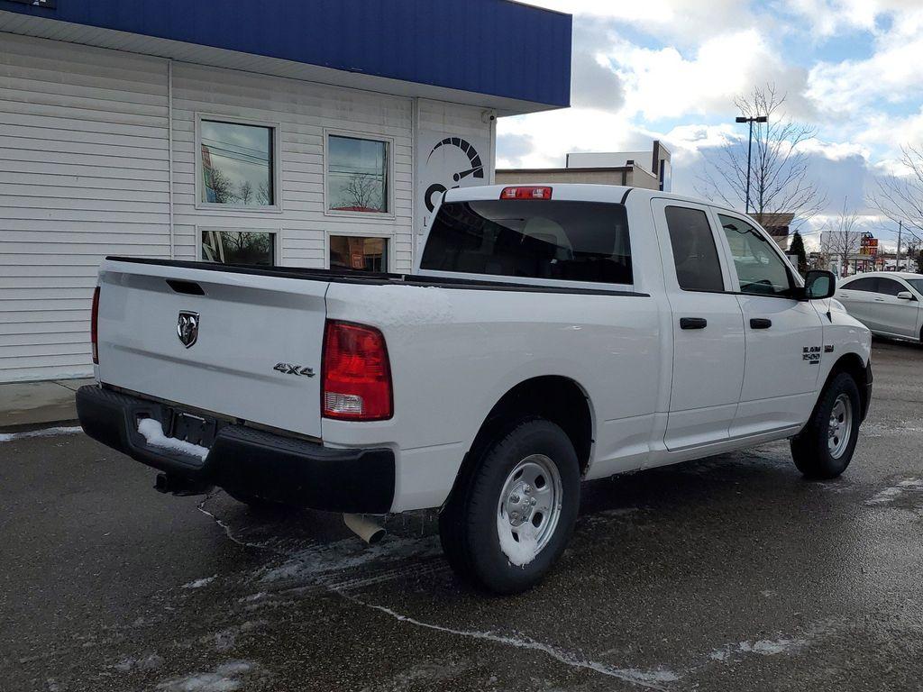 2020 Bright White Clearcoat /Diesel Gray/Black RAM 1500 Classic Tradesman Quad Cab 4WD (1C6RR7FT0LS) with an 5.7L V8 OHV 16V engine, 8A transmission, located at 234 Columbia Ave, Battle Creek, MI, 49015, (269) 222-0088, 42.298264, -85.192543 - Introducing the 2020 Ram 1500 Classic, a robust and versatile pickup that combines power and practicality for any task you throw its way. This model is equipped with a formidable V8, 5.7L engine, ensuring impressive towing capabilities and a smooth driving experience whether on or off the road. The - Photo#1