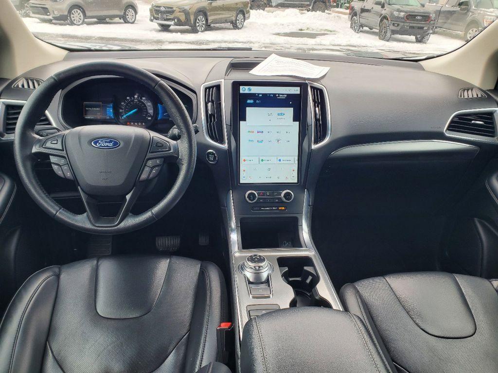 2022 Iconic Silver Metallic /Ebony Ford Edge Titanium AWD (2FMPK4K97NB) with an 2.0L L4 DOHC 16V engine, 6A transmission, located at 6064 Gull Rd, Kalamazoo, MI, 49048, (269) 222-0088, 42.328388, -85.512924 - <b>Vehicle Details</b><br>Discover the perfect blend of sophistication, power, and advanced technology with this stunning 2022 Ford Edge Titanium AWD. This remarkable SUV is designed to elevate every drive with its sleek exterior and luxurious interior, offering a harmonious balance of style and fun - Photo#12