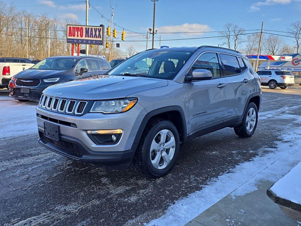 2019 Billet Silver Metallic Clearcoat /Black Jeep Compass Sport 4WD (3C4NJDBB0KT) with an 2.4L L4 DOHC 16V engine, 9-speed automatic transmission, located at 6064 Gull Rd, Kalamazoo, MI, 49048, (269) 222-0088, 42.328388, -85.512924 - When you encounter slick or muddy roads, you can engage the four wheel drive on this unit and drive with confidence. The Jeep Compass offers Android Auto for seamless smartphone integration. Apple CarPlay: Seamless smartphone integration for this unit - stay connected and entertained on the go! It k - Photo#1