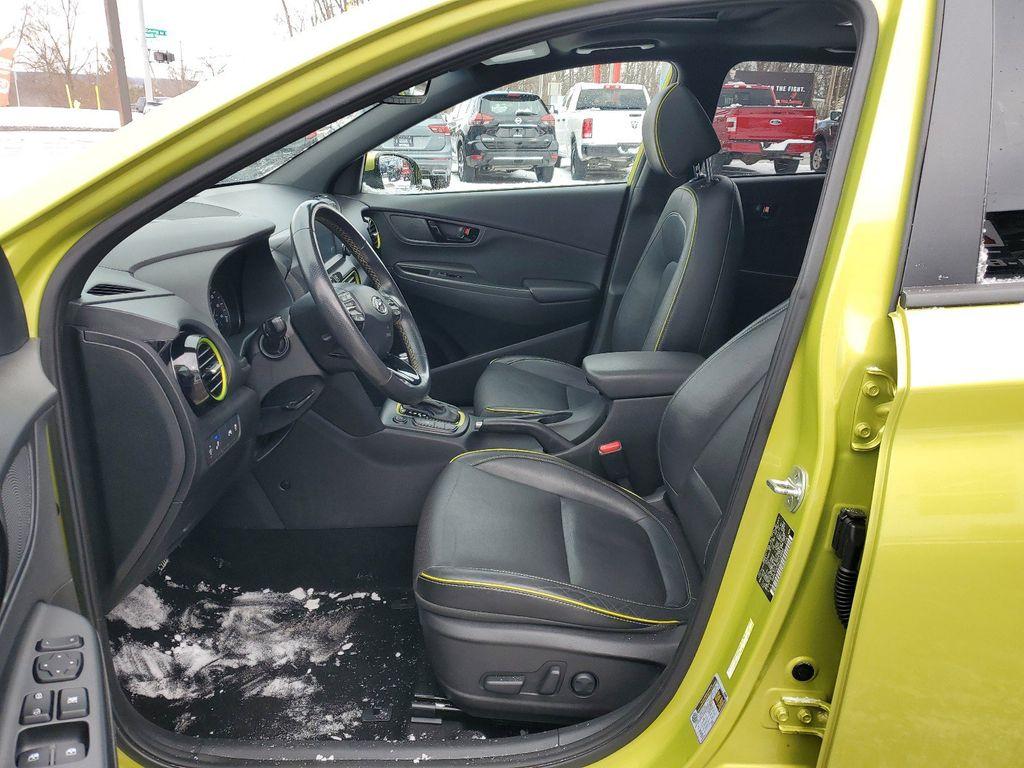 2019 Lime Twist /Black w/Lime Hyundai Kona Limited AWD (KM8K3CA50KU) with an 1.6L L4 DOHC 16V TURBO engine, 7A transmission, located at 234 Columbia Ave, Battle Creek, MI, 49015, (269) 222-0088, 42.298264, -85.192543 - <b>Vehicle Details</b><br>Discover the perfect blend of performance, style, and technology with this stunning 2019 Hyundai Kona Limited, equipped with 4WD and a dynamic 4-cylinder, 1.6L turbocharged engine. This compact SUV promises an exhilarating drive with the confidence of all-wheel drive, makin - Photo#8