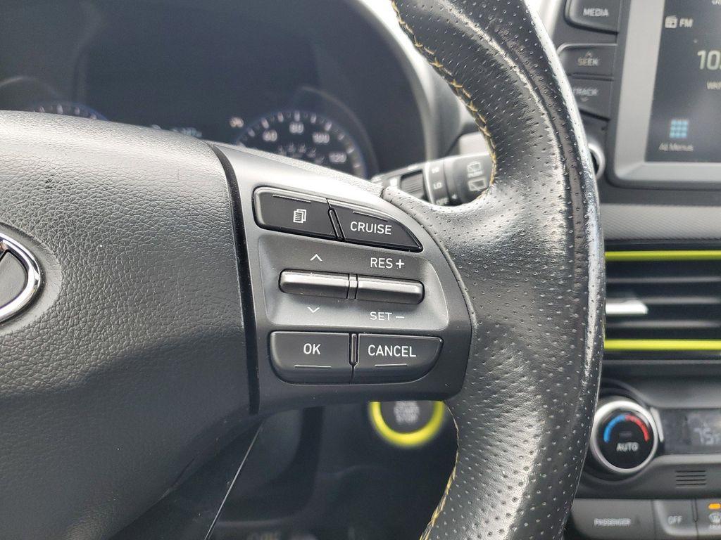 2019 Lime Twist /Black w/Lime Hyundai Kona Limited AWD (KM8K3CA50KU) with an 1.6L L4 DOHC 16V TURBO engine, 7A transmission, located at 234 Columbia Ave, Battle Creek, MI, 49015, (269) 222-0088, 42.298264, -85.192543 - <b>Vehicle Details</b><br>Discover the perfect blend of performance, style, and technology with this stunning 2019 Hyundai Kona Limited, equipped with 4WD and a dynamic 4-cylinder, 1.6L turbocharged engine. This compact SUV promises an exhilarating drive with the confidence of all-wheel drive, makin - Photo#17