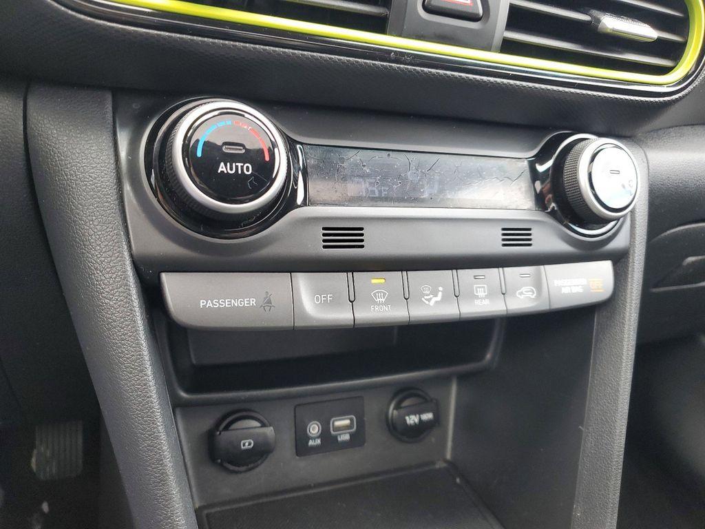 2019 Lime Twist /Black w/Lime Hyundai Kona Limited AWD (KM8K3CA50KU) with an 1.6L L4 DOHC 16V TURBO engine, 7A transmission, located at 234 Columbia Ave, Battle Creek, MI, 49015, (269) 222-0088, 42.298264, -85.192543 - <b>Vehicle Details</b><br>Discover the perfect blend of performance, style, and technology with this stunning 2019 Hyundai Kona Limited, equipped with 4WD and a dynamic 4-cylinder, 1.6L turbocharged engine. This compact SUV promises an exhilarating drive with the confidence of all-wheel drive, makin - Photo#21