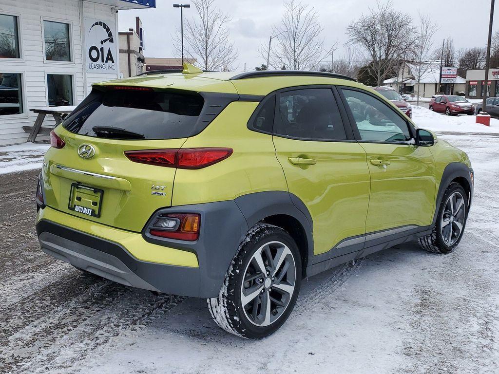 2019 Lime Twist /Black w/Lime Hyundai Kona Limited AWD (KM8K3CA50KU) with an 1.6L L4 DOHC 16V TURBO engine, 7A transmission, located at 234 Columbia Ave, Battle Creek, MI, 49015, (269) 222-0088, 42.298264, -85.192543 - <b>Vehicle Details</b><br>Discover the perfect blend of performance, style, and technology with this stunning 2019 Hyundai Kona Limited, equipped with 4WD and a dynamic 4-cylinder, 1.6L turbocharged engine. This compact SUV promises an exhilarating drive with the confidence of all-wheel drive, makin - Photo#1