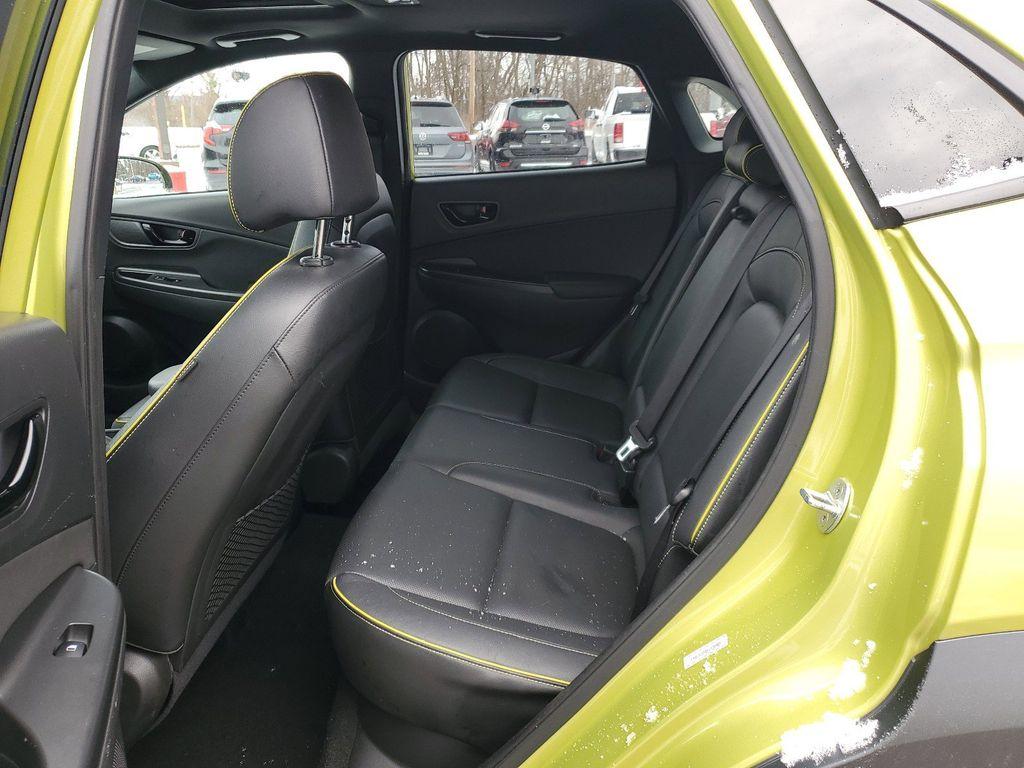 2019 Lime Twist /Black w/Lime Hyundai Kona Limited AWD (KM8K3CA50KU) with an 1.6L L4 DOHC 16V TURBO engine, 7A transmission, located at 234 Columbia Ave, Battle Creek, MI, 49015, (269) 222-0088, 42.298264, -85.192543 - <b>Vehicle Details</b><br>Discover the perfect blend of performance, style, and technology with this stunning 2019 Hyundai Kona Limited, equipped with 4WD and a dynamic 4-cylinder, 1.6L turbocharged engine. This compact SUV promises an exhilarating drive with the confidence of all-wheel drive, makin - Photo#28