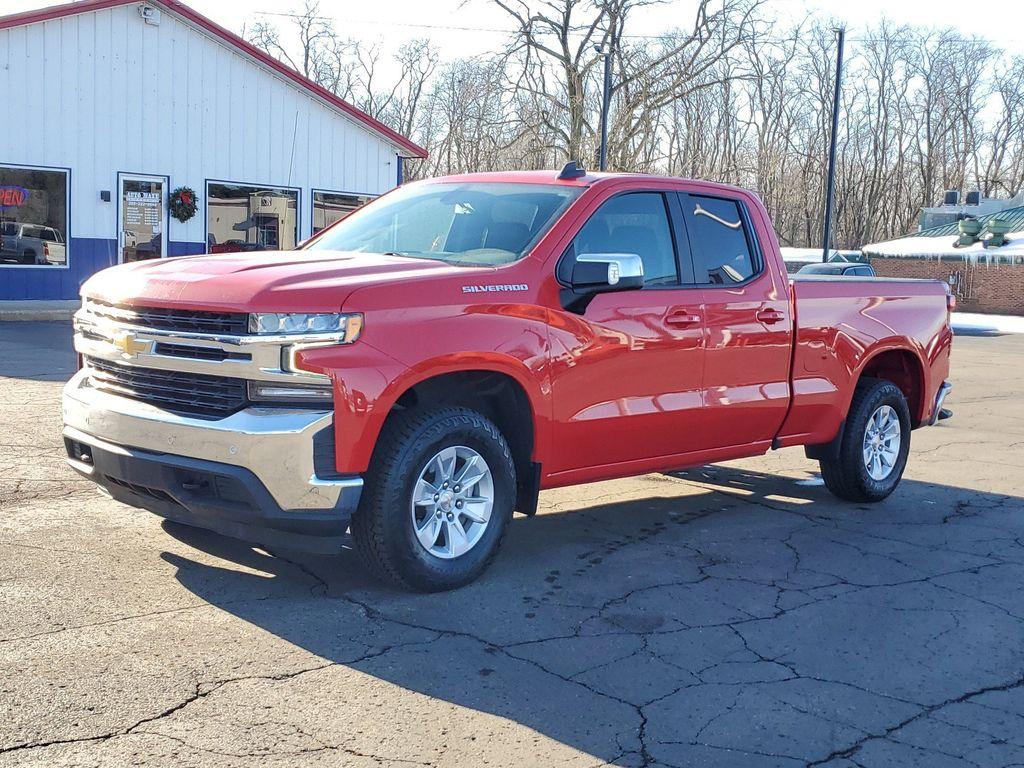 2021 Red Hot /Jet Black Chevrolet Silverado 1500 LT Double Cab 4WD (1GCRYDEK4MZ) with an 2.7L L4 DOHC 16V TURBO engine, 6A transmission, located at 6064 Gull Rd, Kalamazoo, MI, 49048, (269) 222-0088, 42.328388, -85.512924 - Explore the perfect blend of power and efficiency with this pre-owned 2021 Chevrolet Silverado 1500 LT. Equipped with a robust 4-cylinder, 2.7L engine, this truck offers the capability you need with the fuel economy you desire. The advanced 4WD system ensures dependable performance whether you're na - Photo#1