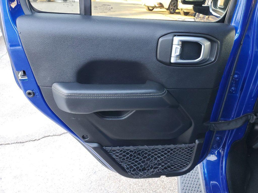 2020 Ocean Blue Metallic Clearcoat /Black Jeep Wrangler Unlimited Sahara (1C4HJXEG7LW) with an 3.6L V6 DOHC 24V FFV engine, 6A transmission, located at 234 Columbia Ave, Battle Creek, MI, 49015, (269) 222-0088, 42.298264, -85.192543 - <b>Equipment</b><br>Carry lots of cargo while your passengers are comfortable. When you encounter slick or muddy roads, you can engage the four wheel drive on this unit and drive with confidence. This unit has a V6, 3.6L high output engine. This 2020 Jeep Wrangler is equipped with a gasoline engine. - Photo#23