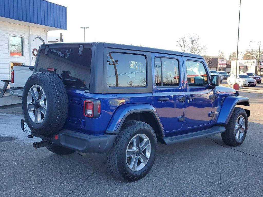 2020 Ocean Blue Metallic Clearcoat /Black Jeep Wrangler Unlimited Sahara (1C4HJXEG7LW) with an 3.6L V6 DOHC 24V FFV engine, 6A transmission, located at 234 Columbia Ave, Battle Creek, MI, 49015, (269) 222-0088, 42.298264, -85.192543 - <b>Equipment</b><br>Carry lots of cargo while your passengers are comfortable. When you encounter slick or muddy roads, you can engage the four wheel drive on this unit and drive with confidence. This unit has a V6, 3.6L high output engine. This 2020 Jeep Wrangler is equipped with a gasoline engine. - Photo#1