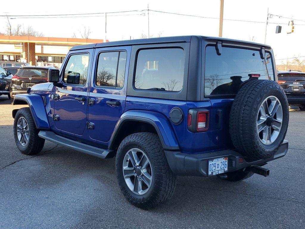 2020 Ocean Blue Metallic Clearcoat /Black Jeep Wrangler Unlimited Sahara (1C4HJXEG7LW) with an 3.6L V6 DOHC 24V FFV engine, 6A transmission, located at 234 Columbia Ave, Battle Creek, MI, 49015, (269) 222-0088, 42.298264, -85.192543 - <b>Equipment</b><br>Carry lots of cargo while your passengers are comfortable. When you encounter slick or muddy roads, you can engage the four wheel drive on this unit and drive with confidence. This unit has a V6, 3.6L high output engine. This 2020 Jeep Wrangler is equipped with a gasoline engine. - Photo#2