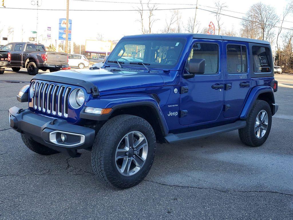 2020 Ocean Blue Metallic Clearcoat /Black Jeep Wrangler Unlimited Sahara (1C4HJXEG7LW) with an 3.6L V6 DOHC 24V FFV engine, 6A transmission, located at 234 Columbia Ave, Battle Creek, MI, 49015, (269) 222-0088, 42.298264, -85.192543 - <b>Equipment</b><br>Carry lots of cargo while your passengers are comfortable. When you encounter slick or muddy roads, you can engage the four wheel drive on this unit and drive with confidence. This unit has a V6, 3.6L high output engine. This 2020 Jeep Wrangler is equipped with a gasoline engine. - Photo#3