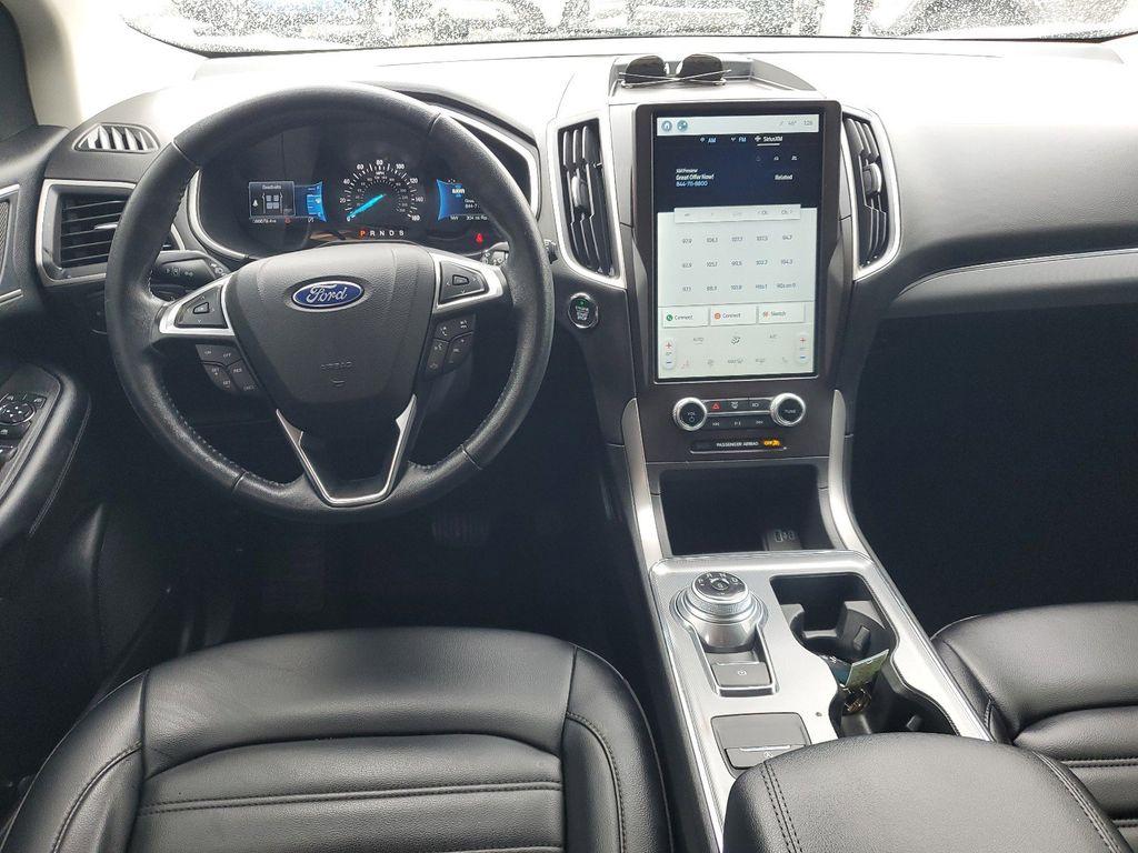 2022 Oxford White /Ebony Ford Edge SEL AWD (2FMPK4J90NB) with an 2.0L L4 DOHC 16V engine, 6A transmission, located at 234 Columbia Ave, Battle Creek, MI, 49015, (269) 222-0088, 42.298264, -85.192543 - Equipment Group 201A: 18&quot; Sparkle Silver-Painted Aluminum Wheels; 3.80 Axle Ratio; ActiveX Seating Material Heated Bucket Seats; 8-Speed Automatic Transmission with SelectShift; Twin-Scroll 2.0L EcoBoost Engine; 245/60R18 AS BSW Tires; TBD GVWR; AM/FM Stereo/MP3 Capable Radio Mini Spare Wheel LED Da - Photo#25