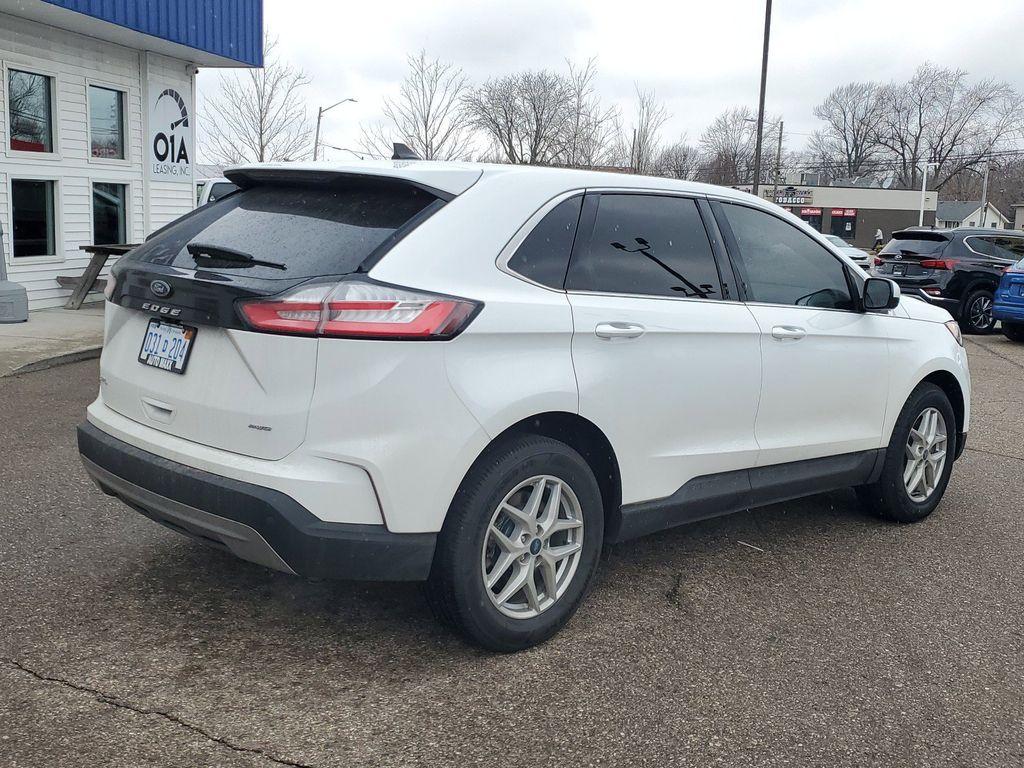 2022 Oxford White /Ebony Ford Edge SEL AWD (2FMPK4J90NB) with an 2.0L L4 DOHC 16V engine, 6A transmission, located at 234 Columbia Ave, Battle Creek, MI, 49015, (269) 222-0088, 42.298264, -85.192543 - Equipment Group 201A: 18&quot; Sparkle Silver-Painted Aluminum Wheels; 3.80 Axle Ratio; ActiveX Seating Material Heated Bucket Seats; 8-Speed Automatic Transmission with SelectShift; Twin-Scroll 2.0L EcoBoost Engine; 245/60R18 AS BSW Tires; TBD GVWR; AM/FM Stereo/MP3 Capable Radio Mini Spare Wheel LED Da - Photo#1