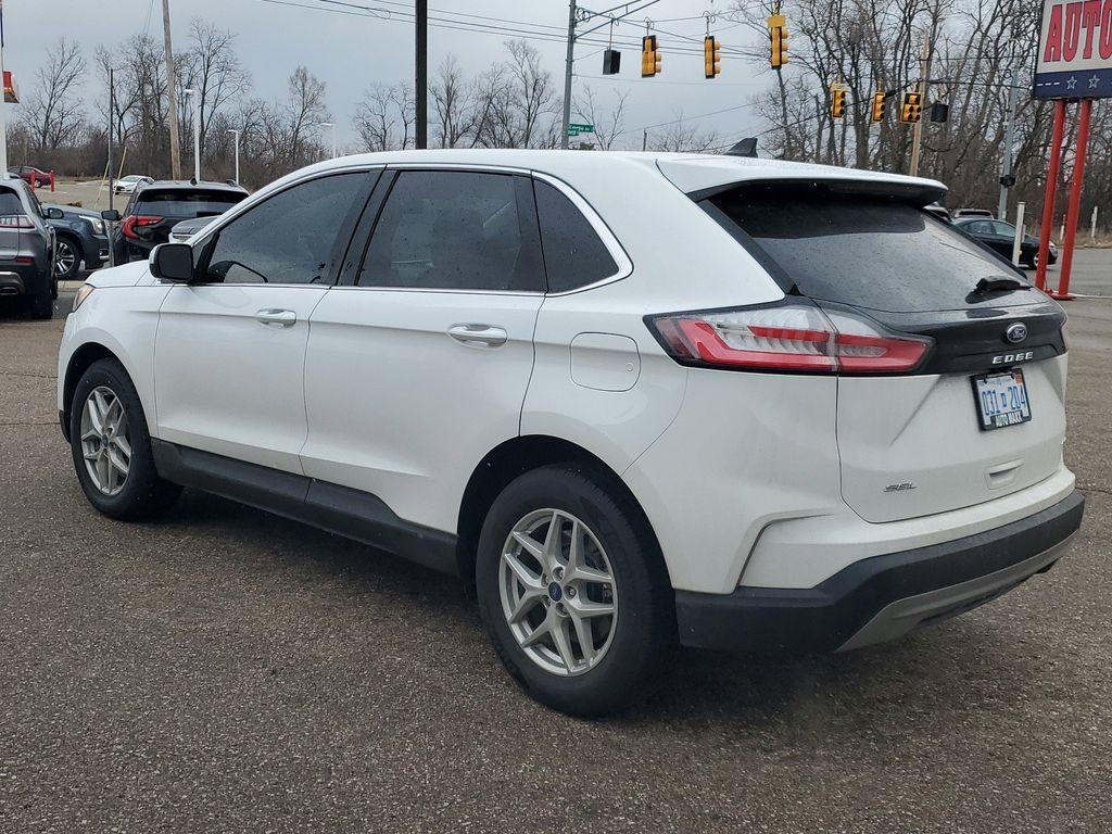 2022 Oxford White /Ebony Ford Edge SEL AWD (2FMPK4J90NB) with an 2.0L L4 DOHC 16V engine, 6A transmission, located at 234 Columbia Ave, Battle Creek, MI, 49015, (269) 222-0088, 42.298264, -85.192543 - Equipment Group 201A: 18&quot; Sparkle Silver-Painted Aluminum Wheels; 3.80 Axle Ratio; ActiveX Seating Material Heated Bucket Seats; 8-Speed Automatic Transmission with SelectShift; Twin-Scroll 2.0L EcoBoost Engine; 245/60R18 AS BSW Tires; TBD GVWR; AM/FM Stereo/MP3 Capable Radio Mini Spare Wheel LED Da - Photo#2