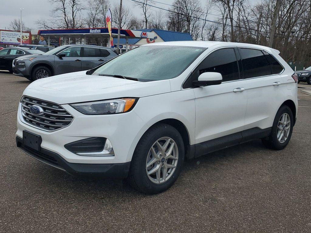 2022 Oxford White /Ebony Ford Edge SEL AWD (2FMPK4J90NB) with an 2.0L L4 DOHC 16V engine, 6A transmission, located at 234 Columbia Ave, Battle Creek, MI, 49015, (269) 222-0088, 42.298264, -85.192543 - Equipment Group 201A: 18&quot; Sparkle Silver-Painted Aluminum Wheels; 3.80 Axle Ratio; ActiveX Seating Material Heated Bucket Seats; 8-Speed Automatic Transmission with SelectShift; Twin-Scroll 2.0L EcoBoost Engine; 245/60R18 AS BSW Tires; TBD GVWR; AM/FM Stereo/MP3 Capable Radio Mini Spare Wheel LED Da - Photo#3