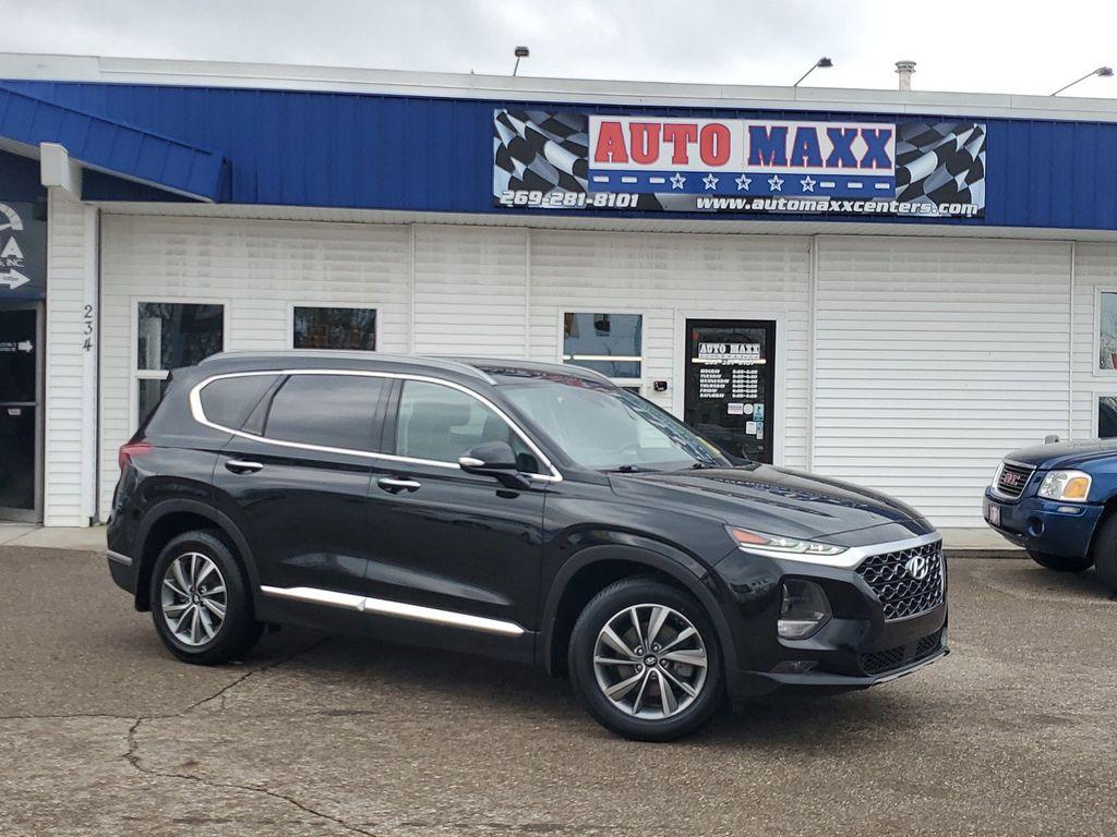 2020 Twilight Black /Black/Black Hyundai Santa Fe SEL 2.4 AWD (5NMS3CAD1LH) with an 2.4L L4 DOHC 16V engine, 8A transmission, located at 234 Columbia Ave, Battle Creek, MI, 49015, (269) 222-0088, 42.298264, -85.192543 - <b>Vehicle Details</b><br>Introducing the 2020 Hyundai Santa Fe SEL, a versatile and stylish SUV designed to elevate your driving experience. Equipped with a robust 4WD system and a fuel-efficient 4-cylinder, 2.4L engine, this vehicle offers a perfect blend of power and efficiency for both city comm - Photo#0