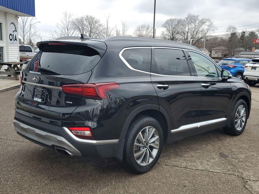 2020 Twilight Black /Black/Black Hyundai Santa Fe SEL 2.4 AWD (5NMS3CAD1LH) with an 2.4L L4 DOHC 16V engine, 8A transmission, located at 234 Columbia Ave, Battle Creek, MI, 49015, (269) 222-0088, 42.298264, -85.192543 - <b>Vehicle Details</b><br>Introducing the 2020 Hyundai Santa Fe SEL, a versatile and stylish SUV designed to elevate your driving experience. Equipped with a robust 4WD system and a fuel-efficient 4-cylinder, 2.4L engine, this vehicle offers a perfect blend of power and efficiency for both city comm - Photo#1