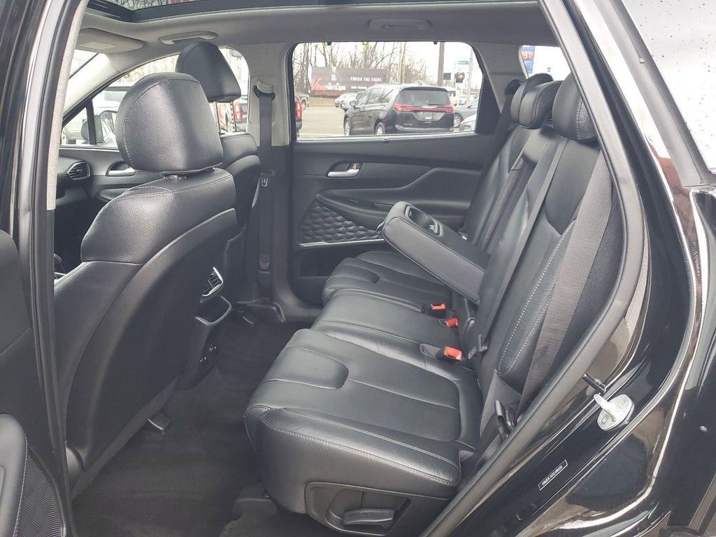 2020 Twilight Black /Black/Black Hyundai Santa Fe SEL 2.4 AWD (5NMS3CAD1LH) with an 2.4L L4 DOHC 16V engine, 8A transmission, located at 234 Columbia Ave, Battle Creek, MI, 49015, (269) 222-0088, 42.298264, -85.192543 - <b>Vehicle Details</b><br>Introducing the 2020 Hyundai Santa Fe SEL, a versatile and stylish SUV designed to elevate your driving experience. Equipped with a robust 4WD system and a fuel-efficient 4-cylinder, 2.4L engine, this vehicle offers a perfect blend of power and efficiency for both city comm - Photo#29