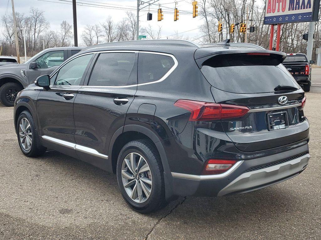 2020 Twilight Black /Black/Black Hyundai Santa Fe SEL 2.4 AWD (5NMS3CAD1LH) with an 2.4L L4 DOHC 16V engine, 8A transmission, located at 234 Columbia Ave, Battle Creek, MI, 49015, (269) 222-0088, 42.298264, -85.192543 - <b>Vehicle Details</b><br>Introducing the 2020 Hyundai Santa Fe SEL, a versatile and stylish SUV designed to elevate your driving experience. Equipped with a robust 4WD system and a fuel-efficient 4-cylinder, 2.4L engine, this vehicle offers a perfect blend of power and efficiency for both city comm - Photo#2