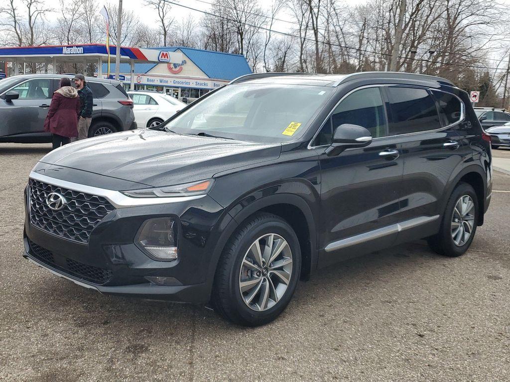 2020 Twilight Black /Black/Black Hyundai Santa Fe SEL 2.4 AWD (5NMS3CAD1LH) with an 2.4L L4 DOHC 16V engine, 8A transmission, located at 234 Columbia Ave, Battle Creek, MI, 49015, (269) 222-0088, 42.298264, -85.192543 - <b>Vehicle Details</b><br>Introducing the 2020 Hyundai Santa Fe SEL, a versatile and stylish SUV designed to elevate your driving experience. Equipped with a robust 4WD system and a fuel-efficient 4-cylinder, 2.4L engine, this vehicle offers a perfect blend of power and efficiency for both city comm - Photo#3