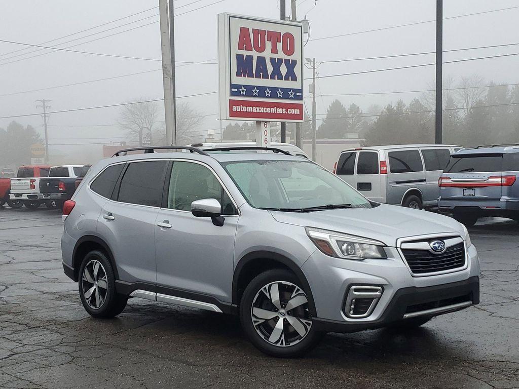 2019 Ice Silver Metallic /Black Subaru Forester Touring (JF2SKAWCXKH) with an 2.5L H4 SOHC 16V engine, CVT transmission, located at 6064 Gull Rd, Kalamazoo, MI, 49048, (269) 222-0088, 42.328388, -85.512924 - Discover the perfect blend of performance, comfort, and reliability with our exceptional 2019 Subaru Forester Touring. This versatile SUV is designed to enhance your driving experience, featuring a robust 4-cylinder, 2.5L engine paired with all-wheel drive to ensure youre ready for any adventure, no - Photo#0