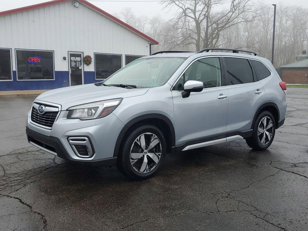 2019 Ice Silver Metallic /Black Subaru Forester Touring (JF2SKAWCXKH) with an 2.5L H4 SOHC 16V engine, CVT transmission, located at 6064 Gull Rd, Kalamazoo, MI, 49048, (269) 222-0088, 42.328388, -85.512924 - Discover the perfect blend of performance, comfort, and reliability with our exceptional 2019 Subaru Forester Touring. This versatile SUV is designed to enhance your driving experience, featuring a robust 4-cylinder, 2.5L engine paired with all-wheel drive to ensure youre ready for any adventure, no - Photo#1