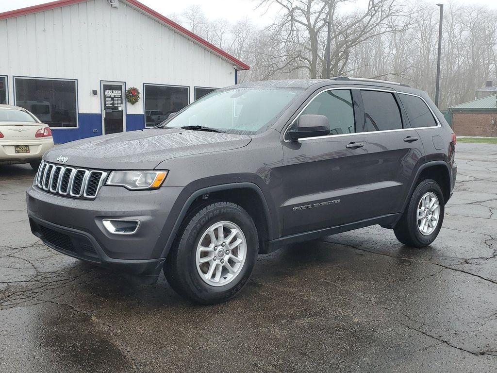 2020 Granite Crystal Metallic Clearcoat /BLACK Jeep Grand Cherokee Laredo 4WD (1C4RJFAG7LC) with an 3.6L V6 DOHC 24V engine, 8A transmission, located at 6064 Gull Rd, Kalamazoo, MI, 49048, (269) 222-0088, 42.328388, -85.512924 - Discover the perfect blend of power and sophistication with this pre-owned 2020 Jeep Grand Cherokee Laredo E, equipped with 4WD for those who crave adventure and reliability. Under the hood lies a robust V6, 3.6L engine that effortlessly balances performance with fuel efficiency, ensuring every jour - Photo#1