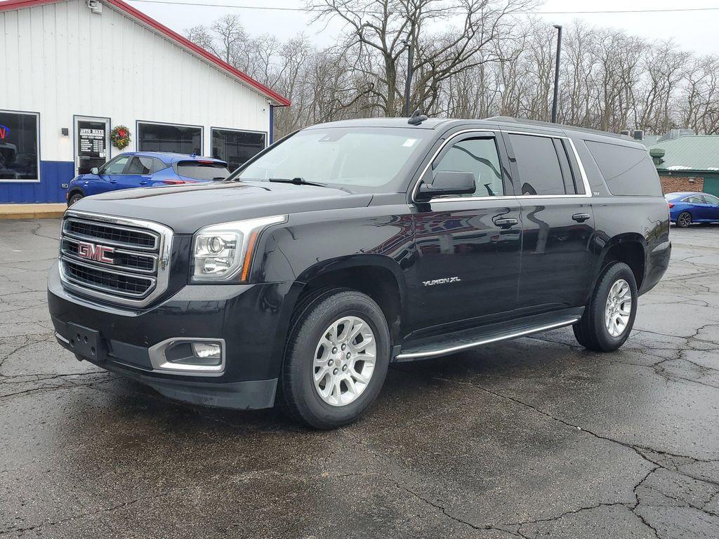 2019 /BLACK GMC Yukon XL SLT 4WD (1GKS2GKC2KR) with an 5.3L V8 OHV 16V engine, 6A transmission, located at 6064 Gull Rd, Kalamazoo, MI, 49048, (269) 222-0088, 42.328388, -85.512924 - Discover the exceptional 2019 GMC Yukon XL 1500 SLT, a versatile and powerful full-size SUV designed to meet all your driving needs. Equipped with a robust V8, 5.3L engine and 4WD capabilities, this vehicle ensures a smooth and commanding drive, whether navigating city streets or exploring off-road - Photo#1