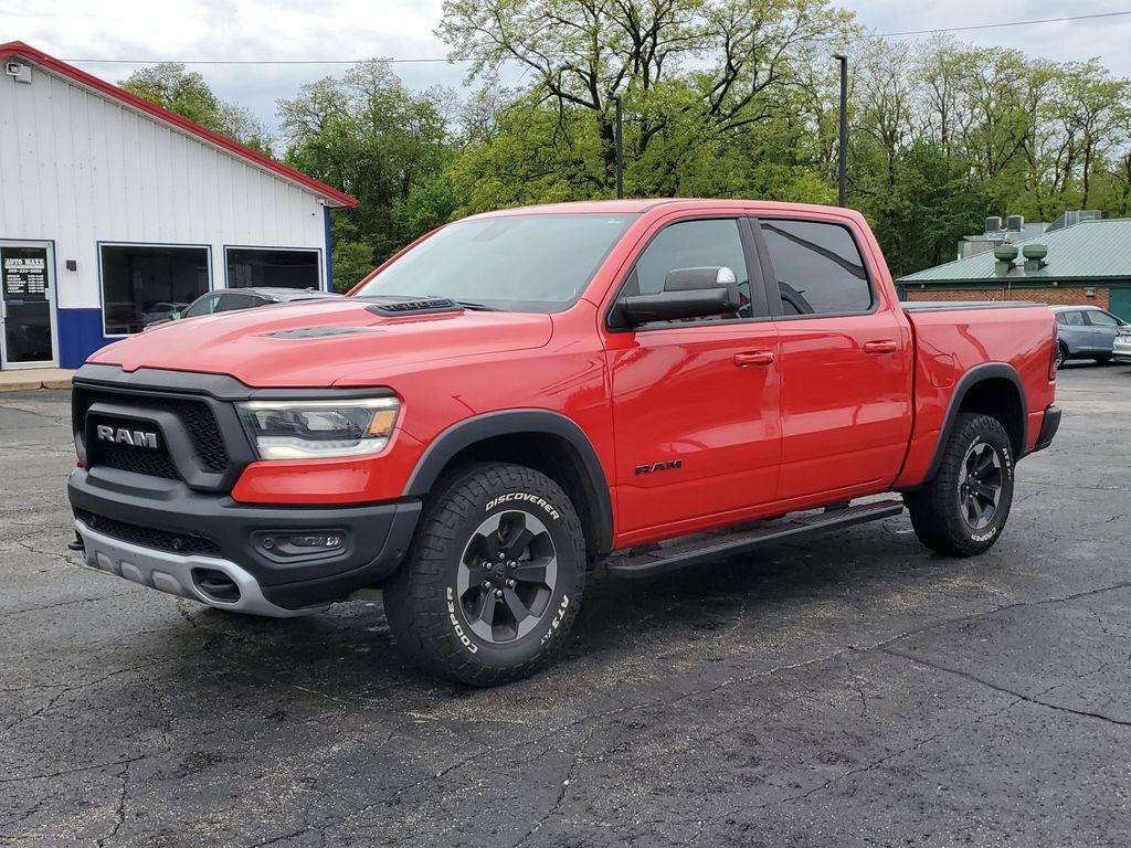 2019 Flame Red Clearcoat /Red/Black RAM 1500 Rebel Crew Cab SB 4WD (1C6SRFLT8KN) with an 5.7L V8 OHV 16V engine, 8A transmission, located at 6064 Gull Rd, Kalamazoo, MI, 49048, (269) 222-0088, 42.328388, -85.512924 - <b>Summary</b><br>Power Moonroof NAVIGATION PACKAGE<br><br><b>Vehicle Details</b><br>Discover the impressive capabilities of the 2019 Ram 1500 Rebel, a robust and reliable pickup designed to tackle any challenge with confidence. Equipped with a powerful V8, 5.7L engine, this 4WD powerhouse delivers - Photo#1