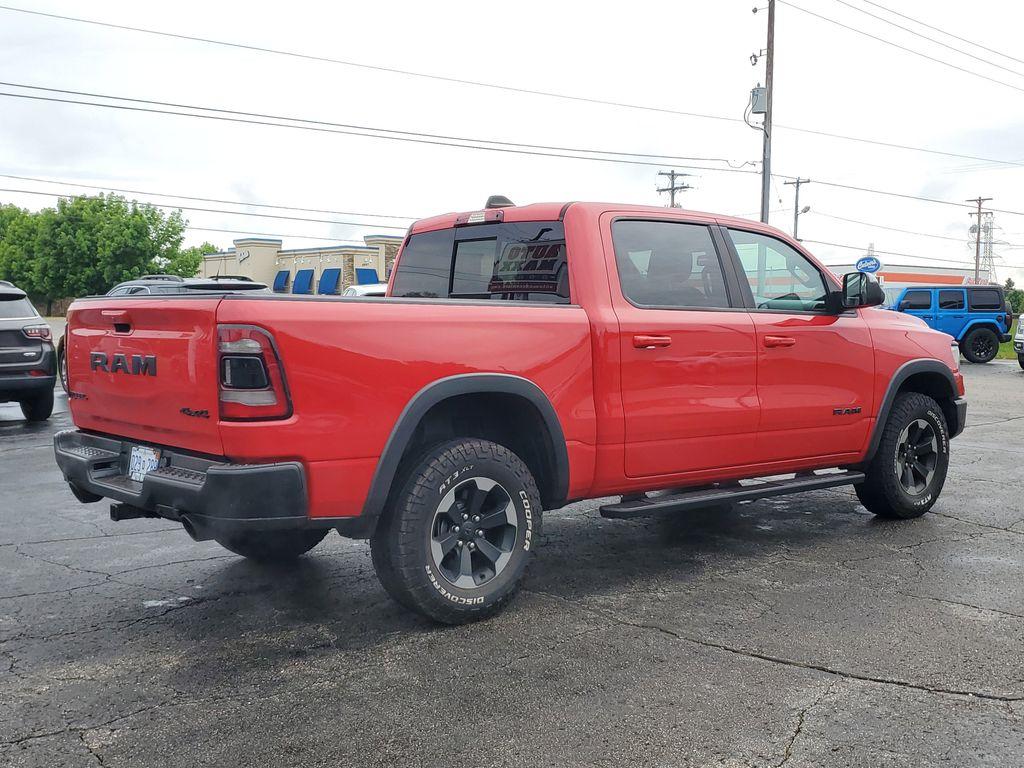 2019 Flame Red Clearcoat /Red/Black RAM 1500 Rebel Crew Cab SB 4WD (1C6SRFLT8KN) with an 5.7L V8 OHV 16V engine, 8A transmission, located at 6064 Gull Rd, Kalamazoo, MI, 49048, (269) 222-0088, 42.328388, -85.512924 - <b>Summary</b><br>Power Moonroof NAVIGATION PACKAGE<br><br><b>Vehicle Details</b><br>Discover the impressive capabilities of the 2019 Ram 1500 Rebel, a robust and reliable pickup designed to tackle any challenge with confidence. Equipped with a powerful V8, 5.7L engine, this 4WD powerhouse delivers - Photo#3