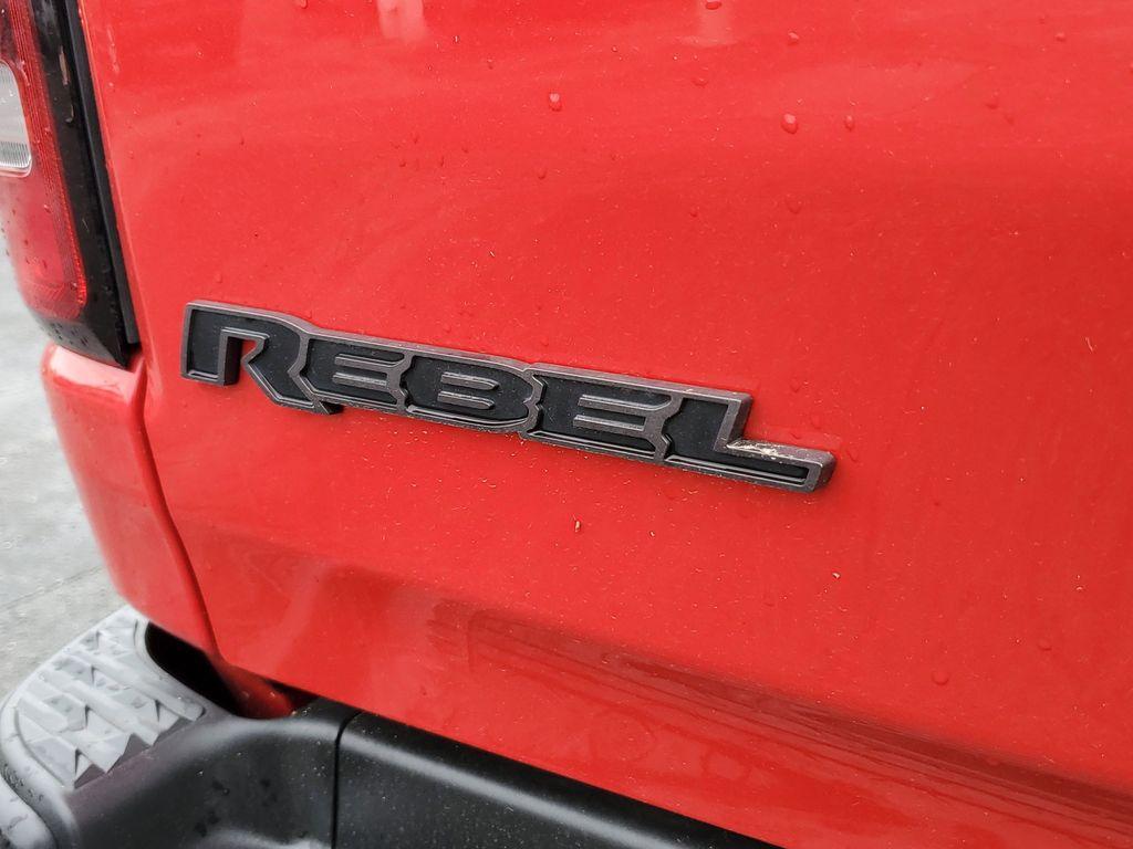 2019 Flame Red Clearcoat /Red/Black RAM 1500 Rebel Crew Cab SB 4WD (1C6SRFLT8KN) with an 5.7L V8 OHV 16V engine, 8A transmission, located at 6064 Gull Rd, Kalamazoo, MI, 49048, (269) 222-0088, 42.328388, -85.512924 - <b>Summary</b><br>Power Moonroof NAVIGATION PACKAGE<br><br><b>Vehicle Details</b><br>Discover the impressive capabilities of the 2019 Ram 1500 Rebel, a robust and reliable pickup designed to tackle any challenge with confidence. Equipped with a powerful V8, 5.7L engine, this 4WD powerhouse delivers - Photo#7