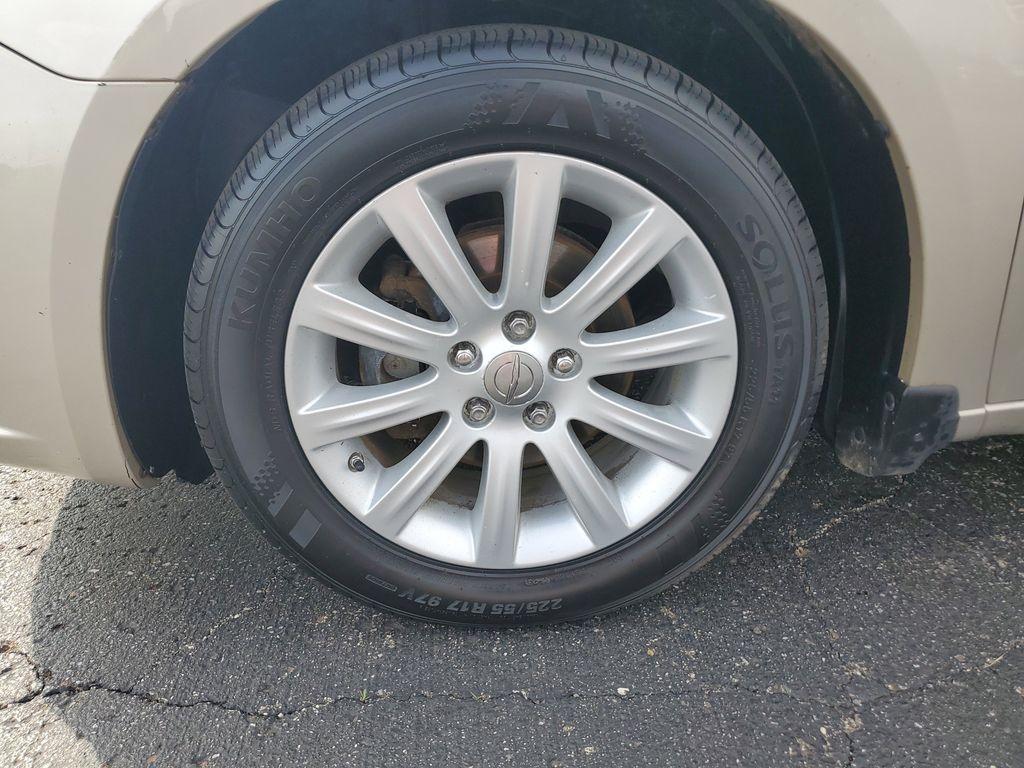 2014 Cashmere Pearlcoat /Light Frost Beige/Black Chrysler 200 LX (1C3CCBAB7EN) with an 2.4L L4 DOHC 16V engine, 6-Speed Automatic transmission, located at 6064 Gull Rd, Kalamazoo, MI, 49048, (269) 222-0088, 42.328388, -85.512924 - Discover the impressive 2014 Chrysler 200 LX, a perfect blend of style and efficiency, now available at an unbeatable price. This well-maintained sedan, featuring a CARFAX Clean Report, offers confidence and peace of mind with every drive. Equipped with front-wheel drive and a robust 4-cylinder, 2.4 - Photo#1