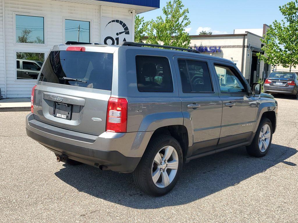 2013 Mineral Gray Metallic Clearcoat /Dark Slate Gray Jeep Patriot Latitude 4WD (1C4NJRFB5DD) with an 2.4L L4 DOHC 16V engine, CVT transmission, located at 234 Columbia Ave, Battle Creek, MI, 49015, (269) 222-0088, 42.298264, -85.192543 - When you encounter slick or muddy roads, you can engage the four wheel drive on this model and drive with confidence. Anti-lock brakes will help you stop in an emergency. The Jeep Patriot has a clean CARFAX vehicle history report. Maintaining a stable interior temperature in this vehicle is easy wit - Photo#1