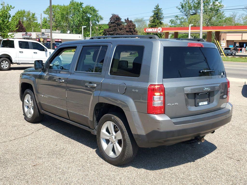 2013 Mineral Gray Metallic Clearcoat /Dark Slate Gray Jeep Patriot Latitude 4WD (1C4NJRFB5DD) with an 2.4L L4 DOHC 16V engine, CVT transmission, located at 234 Columbia Ave, Battle Creek, MI, 49015, (269) 222-0088, 42.298264, -85.192543 - When you encounter slick or muddy roads, you can engage the four wheel drive on this model and drive with confidence. Anti-lock brakes will help you stop in an emergency. The Jeep Patriot has a clean CARFAX vehicle history report. Maintaining a stable interior temperature in this vehicle is easy wit - Photo#2