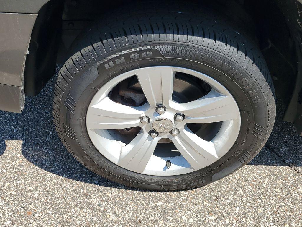 2013 Mineral Gray Metallic Clearcoat /Dark Slate Gray Jeep Patriot Latitude 4WD (1C4NJRFB5DD) with an 2.4L L4 DOHC 16V engine, CVT transmission, located at 234 Columbia Ave, Battle Creek, MI, 49015, (269) 222-0088, 42.298264, -85.192543 - When you encounter slick or muddy roads, you can engage the four wheel drive on this model and drive with confidence. Anti-lock brakes will help you stop in an emergency. The Jeep Patriot has a clean CARFAX vehicle history report. Maintaining a stable interior temperature in this vehicle is easy wit - Photo#4