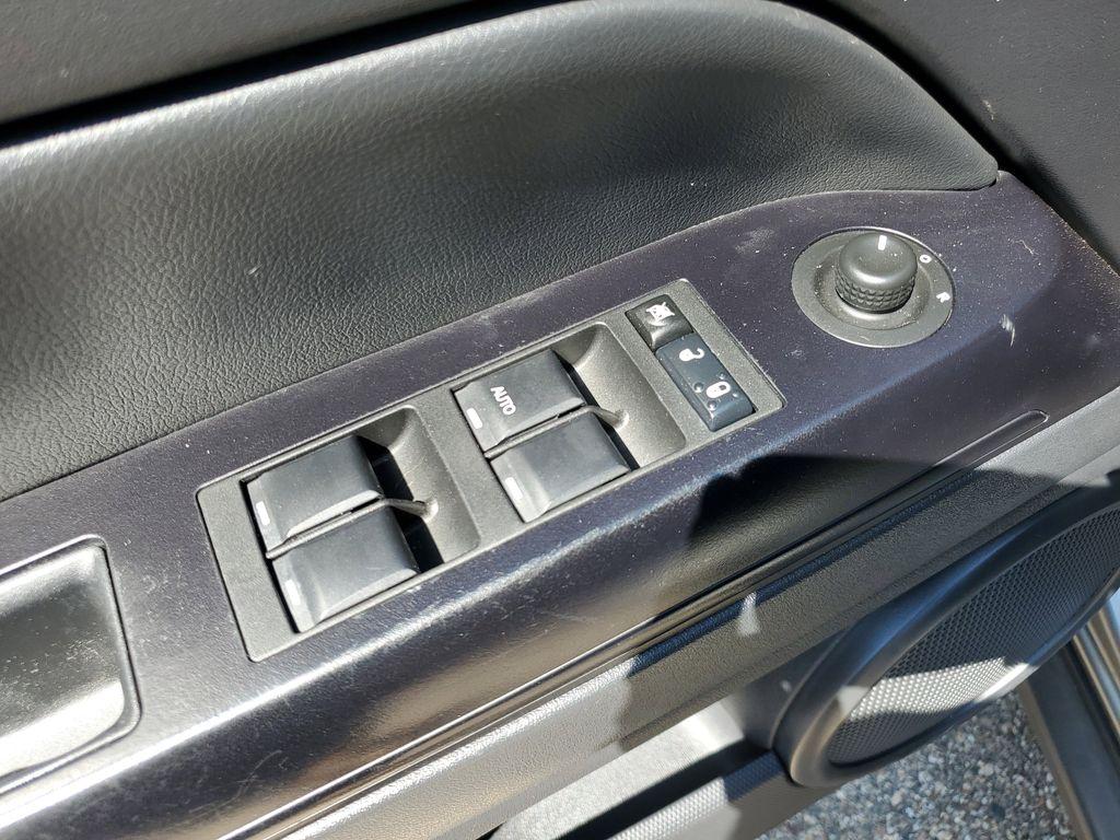 2013 Mineral Gray Metallic Clearcoat /Dark Slate Gray Jeep Patriot Latitude 4WD (1C4NJRFB5DD) with an 2.4L L4 DOHC 16V engine, CVT transmission, located at 234 Columbia Ave, Battle Creek, MI, 49015, (269) 222-0088, 42.298264, -85.192543 - When you encounter slick or muddy roads, you can engage the four wheel drive on this model and drive with confidence. Anti-lock brakes will help you stop in an emergency. The Jeep Patriot has a clean CARFAX vehicle history report. Maintaining a stable interior temperature in this vehicle is easy wit - Photo#6