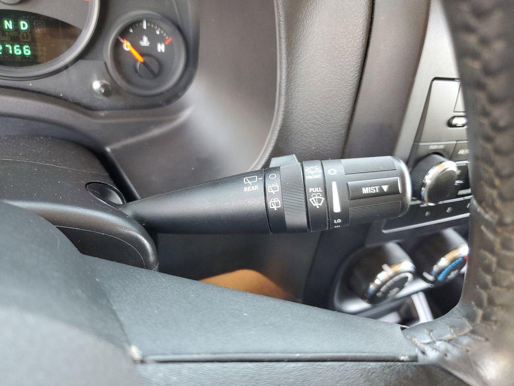 2013 Mineral Gray Metallic Clearcoat /Dark Slate Gray Jeep Patriot Latitude 4WD (1C4NJRFB5DD) with an 2.4L L4 DOHC 16V engine, CVT transmission, located at 234 Columbia Ave, Battle Creek, MI, 49015, (269) 222-0088, 42.298264, -85.192543 - When you encounter slick or muddy roads, you can engage the four wheel drive on this model and drive with confidence. Anti-lock brakes will help you stop in an emergency. The Jeep Patriot has a clean CARFAX vehicle history report. Maintaining a stable interior temperature in this vehicle is easy wit - Photo#13