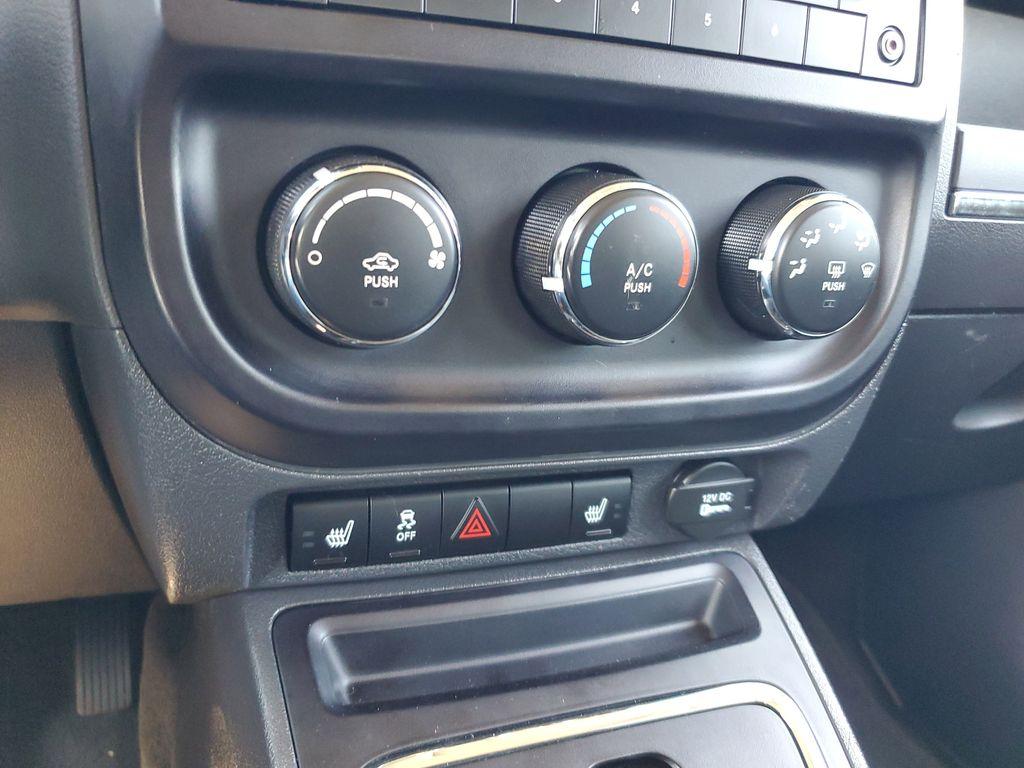 2013 Mineral Gray Metallic Clearcoat /Dark Slate Gray Jeep Patriot Latitude 4WD (1C4NJRFB5DD) with an 2.4L L4 DOHC 16V engine, CVT transmission, located at 234 Columbia Ave, Battle Creek, MI, 49015, (269) 222-0088, 42.298264, -85.192543 - When you encounter slick or muddy roads, you can engage the four wheel drive on this model and drive with confidence. Anti-lock brakes will help you stop in an emergency. The Jeep Patriot has a clean CARFAX vehicle history report. Maintaining a stable interior temperature in this vehicle is easy wit - Photo#17