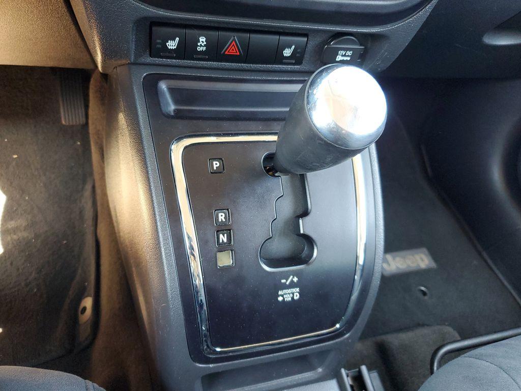 2013 Mineral Gray Metallic Clearcoat /Dark Slate Gray Jeep Patriot Latitude 4WD (1C4NJRFB5DD) with an 2.4L L4 DOHC 16V engine, CVT transmission, located at 234 Columbia Ave, Battle Creek, MI, 49015, (269) 222-0088, 42.298264, -85.192543 - When you encounter slick or muddy roads, you can engage the four wheel drive on this model and drive with confidence. Anti-lock brakes will help you stop in an emergency. The Jeep Patriot has a clean CARFAX vehicle history report. Maintaining a stable interior temperature in this vehicle is easy wit - Photo#18