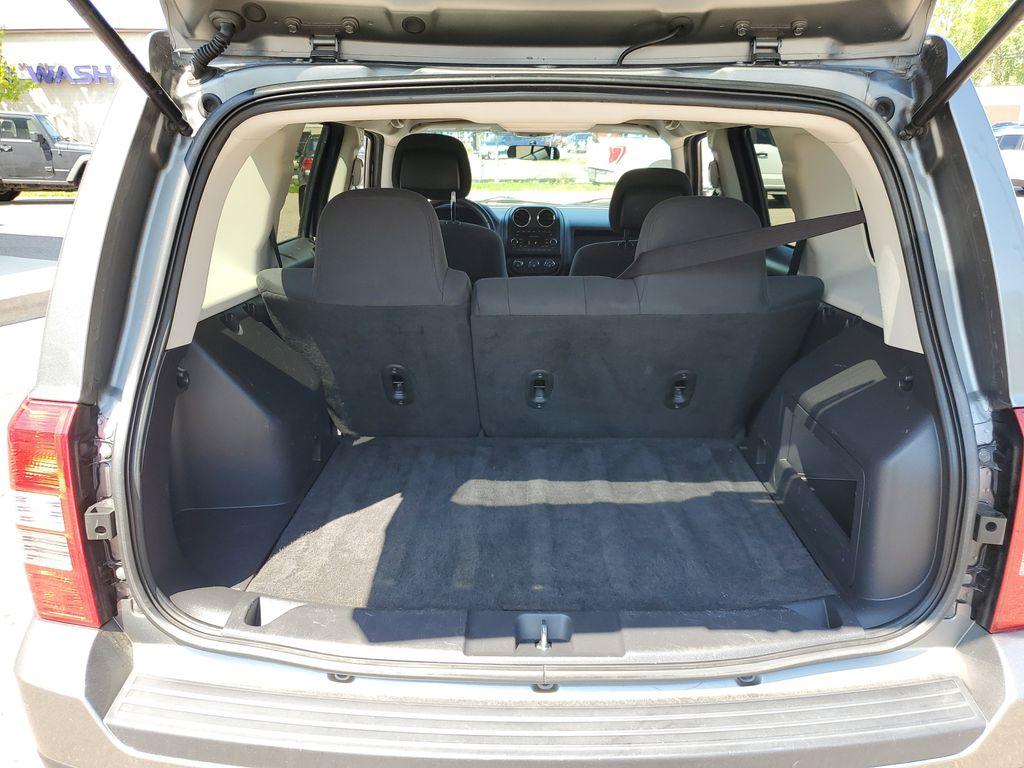2013 Mineral Gray Metallic Clearcoat /Dark Slate Gray Jeep Patriot Latitude 4WD (1C4NJRFB5DD) with an 2.4L L4 DOHC 16V engine, CVT transmission, located at 234 Columbia Ave, Battle Creek, MI, 49015, (269) 222-0088, 42.298264, -85.192543 - When you encounter slick or muddy roads, you can engage the four wheel drive on this model and drive with confidence. Anti-lock brakes will help you stop in an emergency. The Jeep Patriot has a clean CARFAX vehicle history report. Maintaining a stable interior temperature in this vehicle is easy wit - Photo#22