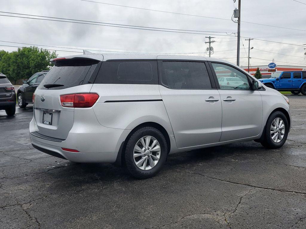 2016 Bright Silver Metallic /Gray Kia Sedona L (KNDMA5C1XG6) with an 3.3L V6 DOHC 24V engine, 6A transmission, located at 6064 Gull Rd, Kalamazoo, MI, 49048, (269) 222-0088, 42.328388, -85.512924 - Discover the 2016 Kia Sedona L, a versatile minivan that combines practicality with performance. This well-maintained vehicle comes equipped with front-wheel drive and a robust V6, 3.3L engine, offering a smooth and responsive driving experience ideal for both city commutes and long road trips.<br>< - Photo#3