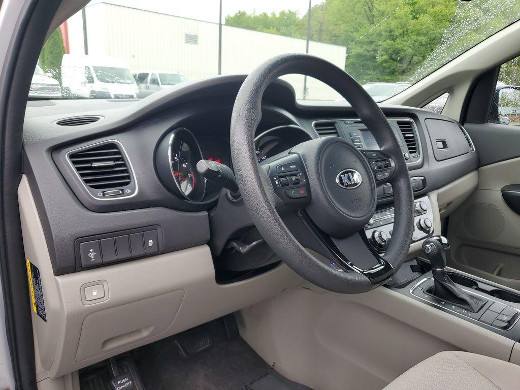 2016 Bright Silver Metallic /Gray Kia Sedona L (KNDMA5C1XG6) with an 3.3L V6 DOHC 24V engine, 6A transmission, located at 6064 Gull Rd, Kalamazoo, MI, 49048, (269) 222-0088, 42.328388, -85.512924 - Discover the 2016 Kia Sedona L, a versatile minivan that combines practicality with performance. This well-maintained vehicle comes equipped with front-wheel drive and a robust V6, 3.3L engine, offering a smooth and responsive driving experience ideal for both city commutes and long road trips.<br>< - Photo#12
