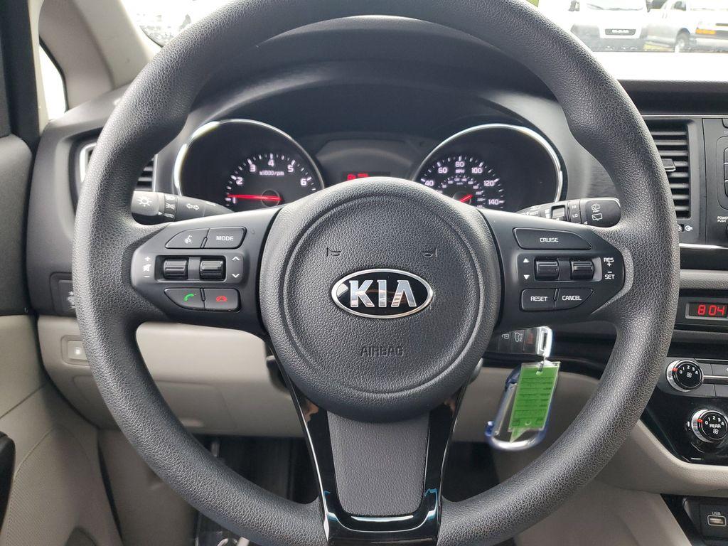 2016 Bright Silver Metallic /Gray Kia Sedona L (KNDMA5C1XG6) with an 3.3L V6 DOHC 24V engine, 6A transmission, located at 6064 Gull Rd, Kalamazoo, MI, 49048, (269) 222-0088, 42.328388, -85.512924 - Discover the 2016 Kia Sedona L, a versatile minivan that combines practicality with performance. This well-maintained vehicle comes equipped with front-wheel drive and a robust V6, 3.3L engine, offering a smooth and responsive driving experience ideal for both city commutes and long road trips.<br>< - Photo#14