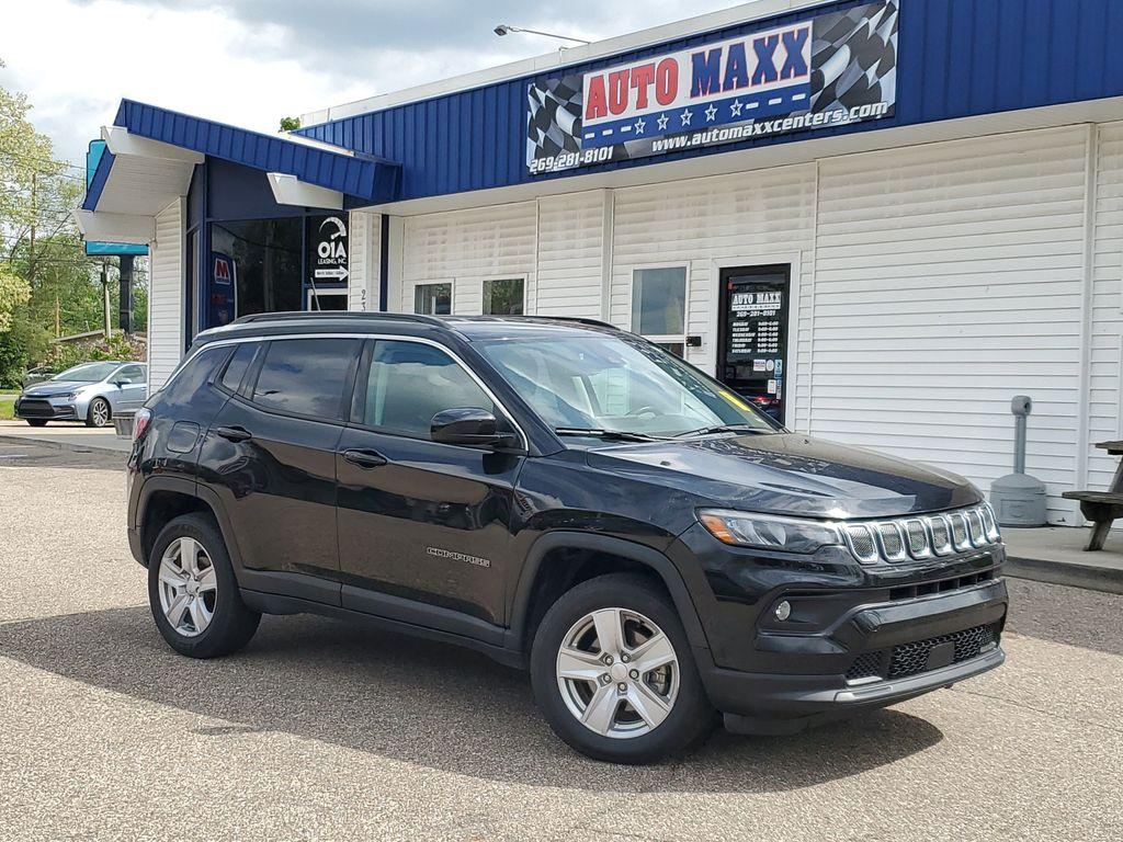 2022 Diamond Black Crystal Pearlcoat /Black Jeep Compass Latitude 4WD (3C4NJDBB5NT) with an 2.4L L4 DOHC 16V engine, 9-speed automatic transmission, located at 234 Columbia Ave, Battle Creek, MI, 49015, (269) 222-0088, 42.298264, -85.192543 - <b>Vehicle Details</b><br>Experience the perfect blend of style, performance, and technology with this exceptional 2022 Jeep Compass Latitude. Designed to conquer both city streets and off-road trails, this versatile SUV features a robust 4WD system paired with a fuel-efficient 4-cylinder, 2.4L engi - Photo#0