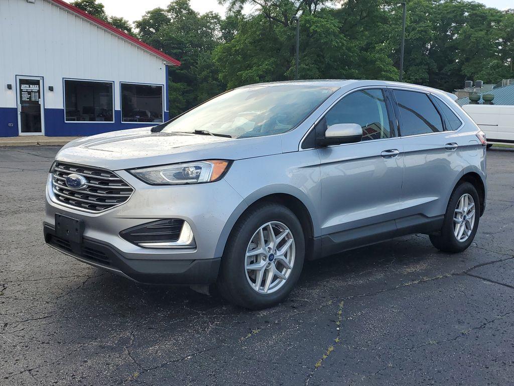2022 Iconic Silver Metallic /Ebony Ford Edge SEL AWD (2FMPK4J93NB) with an 2.0L L4 DOHC 16V engine, 6A transmission, located at 6064 Gull Rd, Kalamazoo, MI, 49048, (269) 222-0088, 42.328388, -85.512924 - Discover the impressive 2022 Ford Edge SEL with AWD, a vehicle that seamlessly blends performance and sophistication. This stylish SUV is equipped with a robust 4-cylinder, 2.0L engine, providing a smooth and efficient driving experience. Its AWD capability ensures exceptional handling and stability - Photo#1