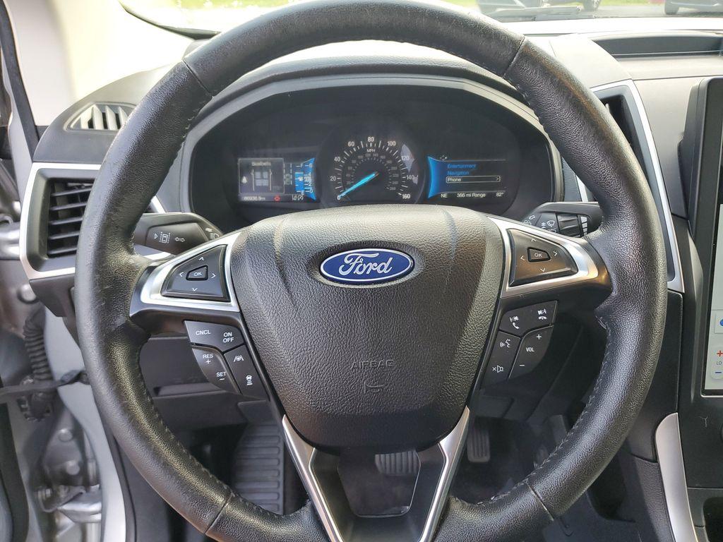 2022 Iconic Silver Metallic /Ebony Ford Edge SEL AWD (2FMPK4J93NB) with an 2.0L L4 DOHC 16V engine, 6A transmission, located at 6064 Gull Rd, Kalamazoo, MI, 49048, (269) 222-0088, 42.328388, -85.512924 - Discover the impressive 2022 Ford Edge SEL with AWD, a vehicle that seamlessly blends performance and sophistication. This stylish SUV is equipped with a robust 4-cylinder, 2.0L engine, providing a smooth and efficient driving experience. Its AWD capability ensures exceptional handling and stability - Photo#18