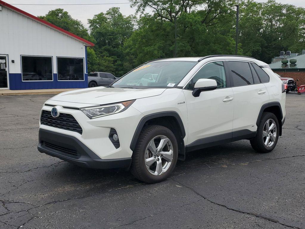 2021 Blizzard Pearl /Ash Toyota RAV4 Hybrid XLE AWD (2T3B6RFV5MW) with an 2.5L L4 DOHC 16V HYBRID engine, CVT transmission, located at 6064 Gull Rd, Kalamazoo, MI, 49048, (269) 222-0088, 42.328388, -85.512924 - Discover the perfect blend of reliability and style with this 2021 Toyota RAV4 XLE Premium, now available with AWD for enhanced performance. This versatile SUV is powered by a robust 4-cylinder, 2.5L engine, ensuring a smooth and efficient driving experience.<br><br>This Toyota RAV4 comes with a CAR - Photo#1