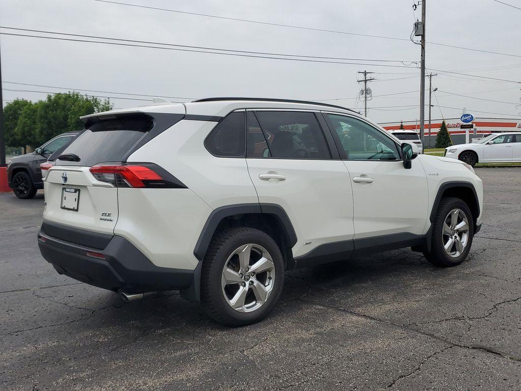 2021 Blizzard Pearl /Ash Toyota RAV4 Hybrid XLE AWD (2T3B6RFV5MW) with an 2.5L L4 DOHC 16V HYBRID engine, CVT transmission, located at 6064 Gull Rd, Kalamazoo, MI, 49048, (269) 222-0088, 42.328388, -85.512924 - Discover the perfect blend of reliability and style with this 2021 Toyota RAV4 XLE Premium, now available with AWD for enhanced performance. This versatile SUV is powered by a robust 4-cylinder, 2.5L engine, ensuring a smooth and efficient driving experience.<br><br>This Toyota RAV4 comes with a CAR - Photo#3