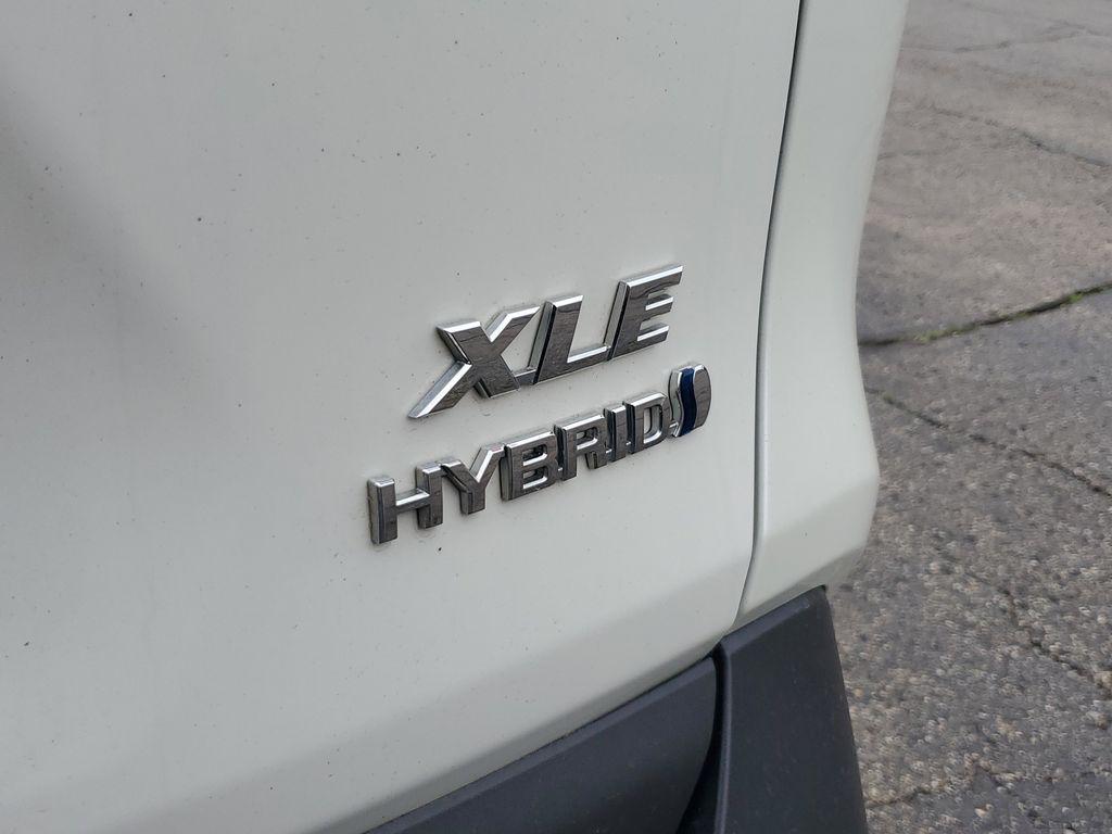 2021 Blizzard Pearl /Ash Toyota RAV4 Hybrid XLE AWD (2T3B6RFV5MW) with an 2.5L L4 DOHC 16V HYBRID engine, CVT transmission, located at 6064 Gull Rd, Kalamazoo, MI, 49048, (269) 222-0088, 42.328388, -85.512924 - Discover the perfect blend of reliability and style with this 2021 Toyota RAV4 XLE Premium, now available with AWD for enhanced performance. This versatile SUV is powered by a robust 4-cylinder, 2.5L engine, ensuring a smooth and efficient driving experience.<br><br>This Toyota RAV4 comes with a CAR - Photo#5