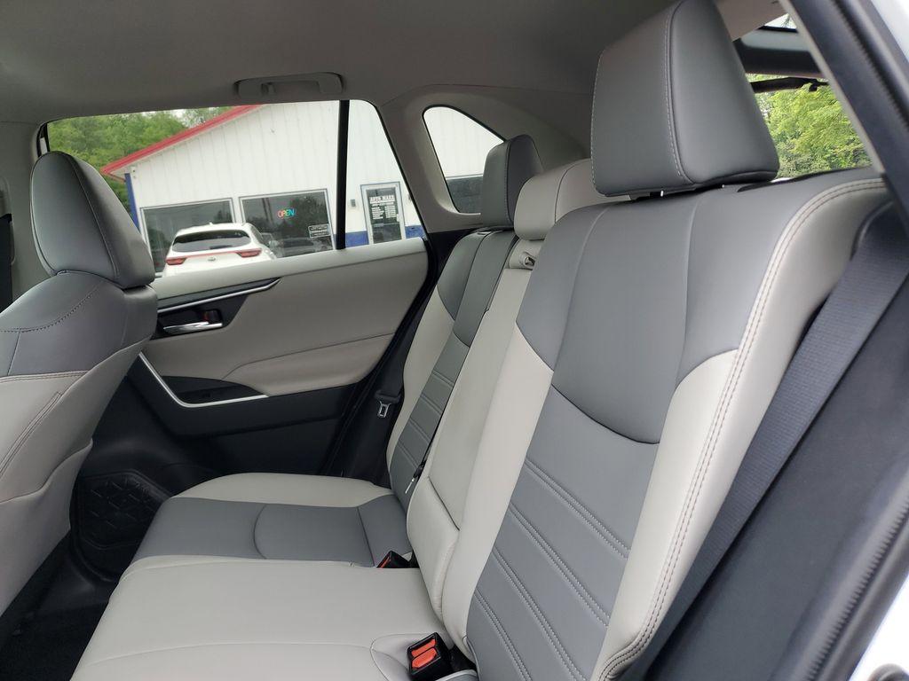 2021 Blizzard Pearl /Ash Toyota RAV4 Hybrid XLE AWD (2T3B6RFV5MW) with an 2.5L L4 DOHC 16V HYBRID engine, CVT transmission, located at 6064 Gull Rd, Kalamazoo, MI, 49048, (269) 222-0088, 42.328388, -85.512924 - Discover the perfect blend of reliability and style with this 2021 Toyota RAV4 XLE Premium, now available with AWD for enhanced performance. This versatile SUV is powered by a robust 4-cylinder, 2.5L engine, ensuring a smooth and efficient driving experience.<br><br>This Toyota RAV4 comes with a CAR - Photo#7