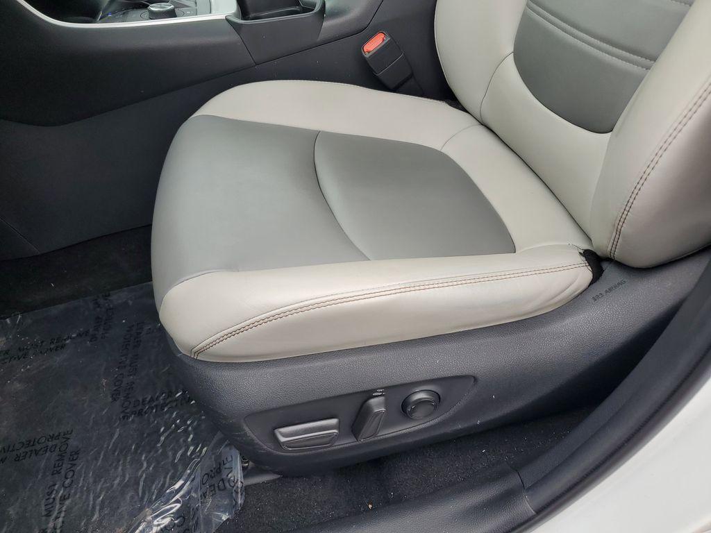 2021 Blizzard Pearl /Ash Toyota RAV4 Hybrid XLE AWD (2T3B6RFV5MW) with an 2.5L L4 DOHC 16V HYBRID engine, CVT transmission, located at 6064 Gull Rd, Kalamazoo, MI, 49048, (269) 222-0088, 42.328388, -85.512924 - Discover the perfect blend of reliability and style with this 2021 Toyota RAV4 XLE Premium, now available with AWD for enhanced performance. This versatile SUV is powered by a robust 4-cylinder, 2.5L engine, ensuring a smooth and efficient driving experience.<br><br>This Toyota RAV4 comes with a CAR - Photo#12